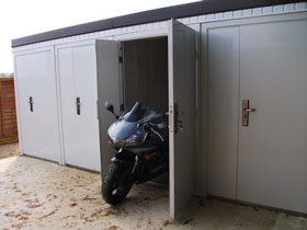 The Concrete MiniStor with bike with the double doors open