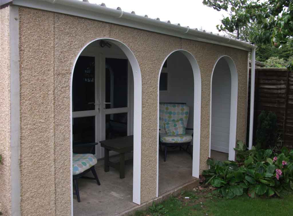 Concrete Garage Arched moreton garage with 3 arches looking out into the garden